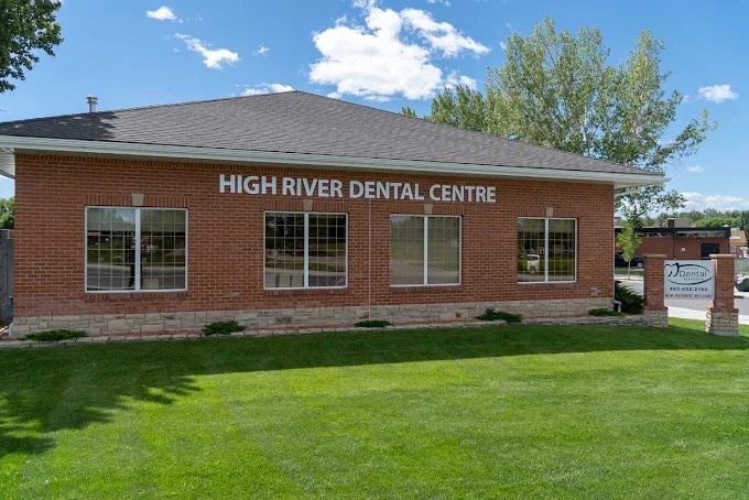 High River Dental Centre building with signage on the brick exterior